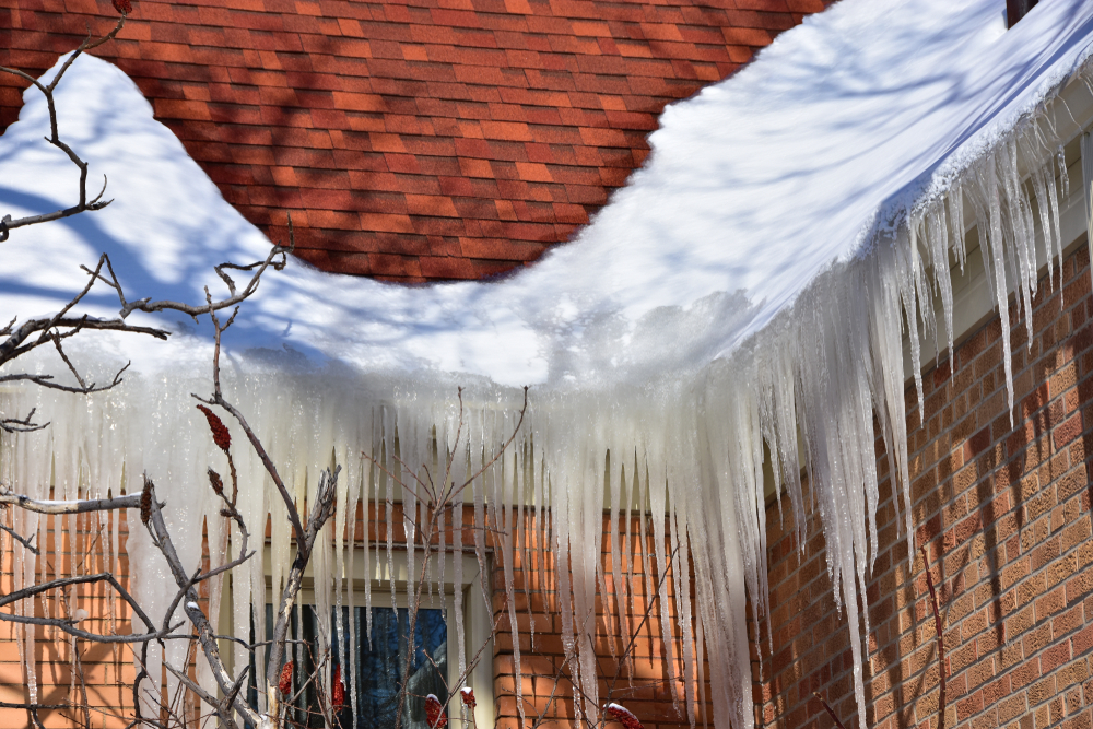Ice build-up on a roof cause an ice dam