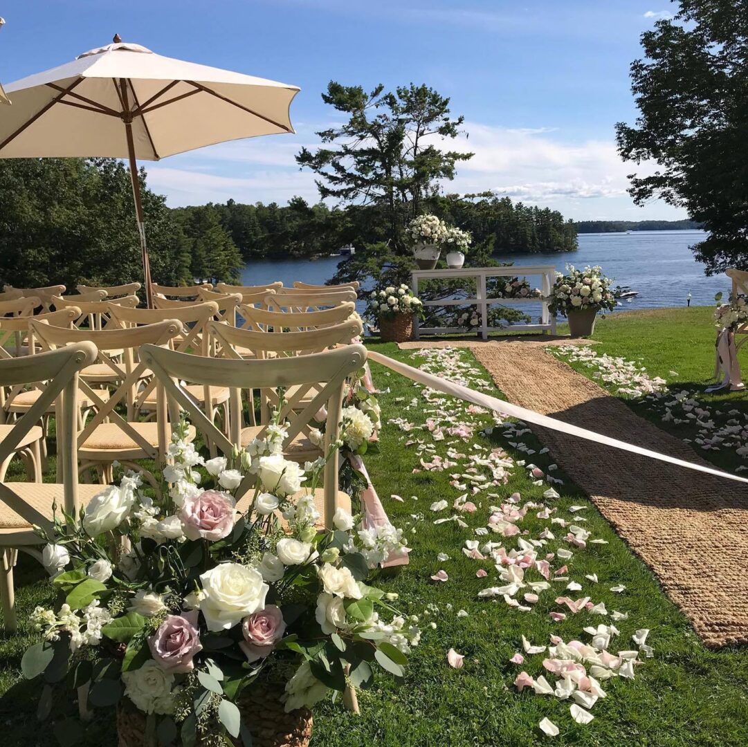 Outdoor chairs are set up for a wedding