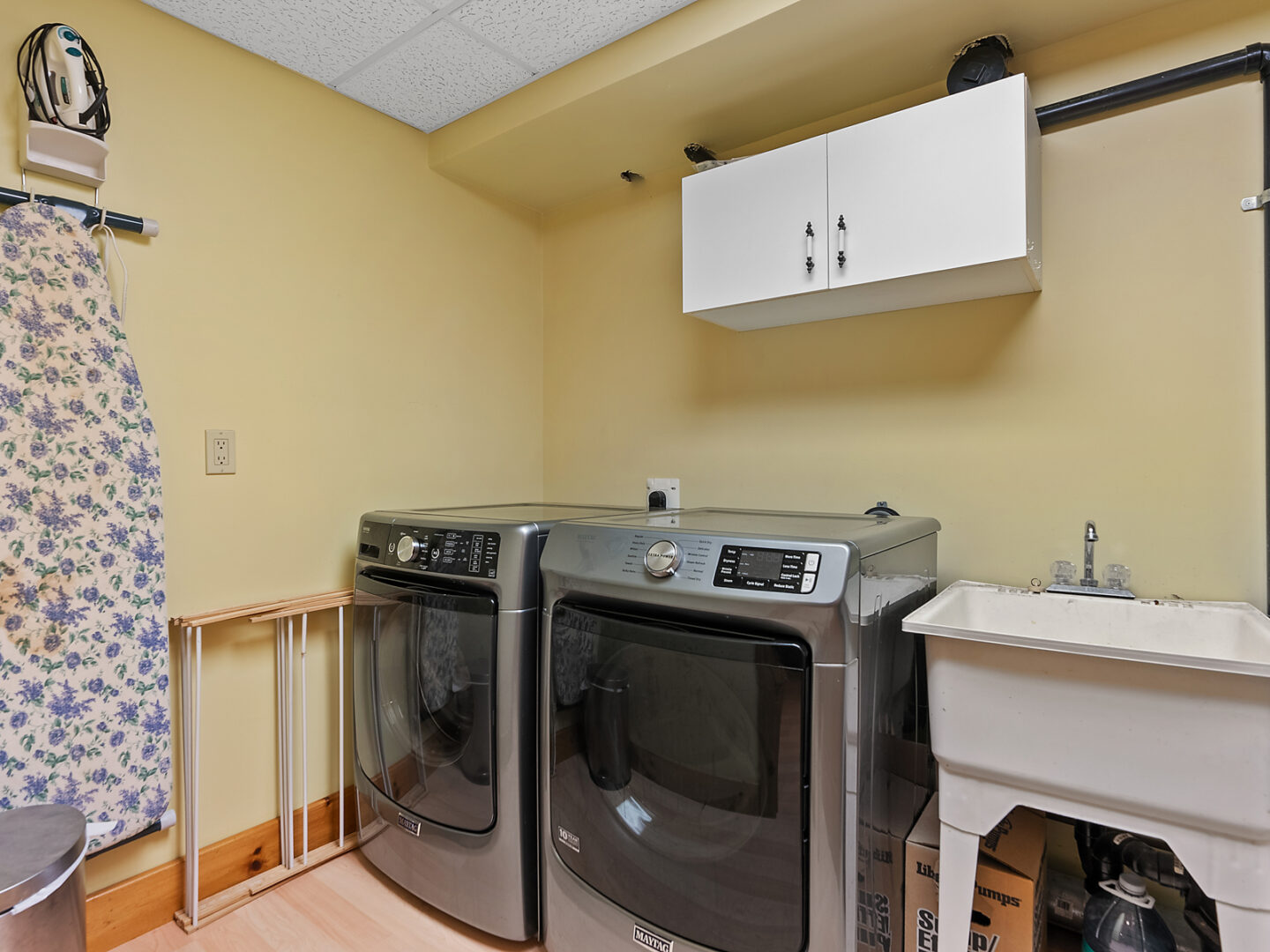 A small space with a washing machine and dryer.