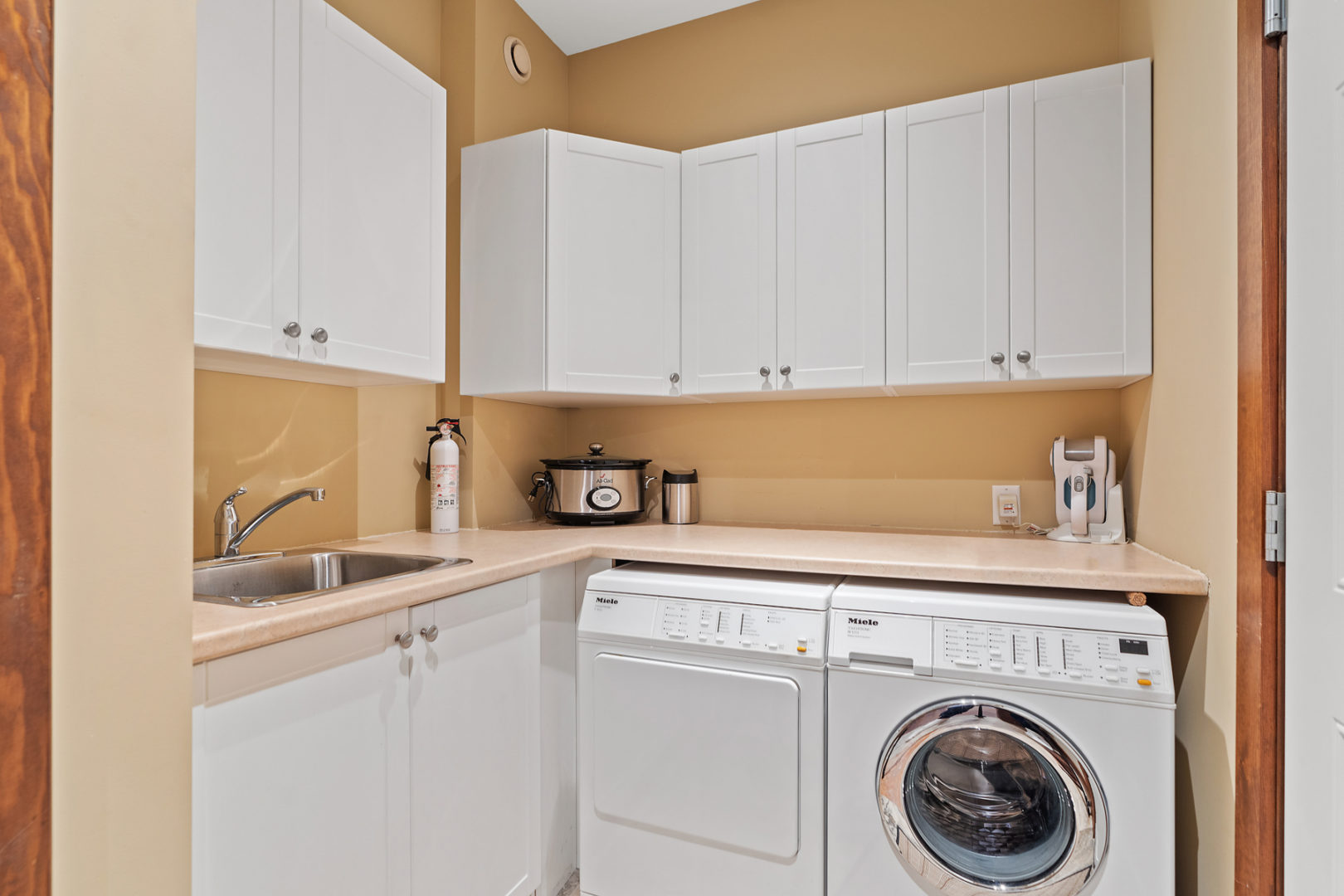 A laundry area with a washer and dryer.
