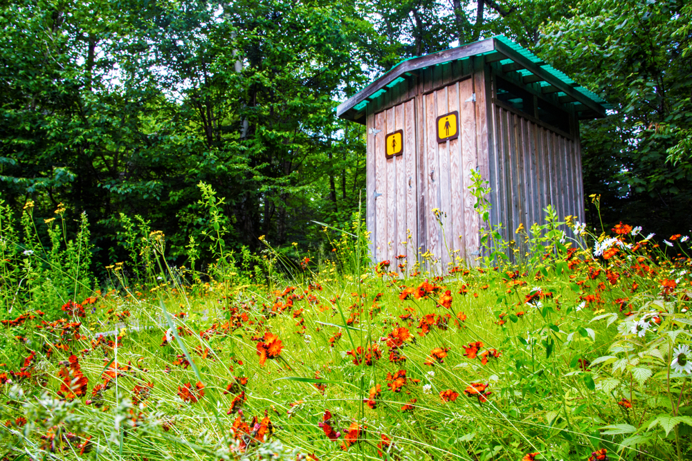 Outdoor bathroom in the woods