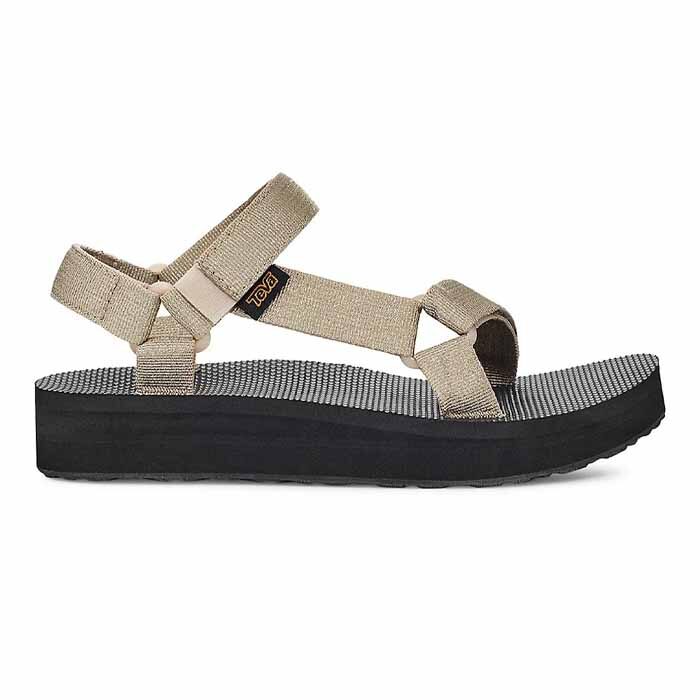 beige teva sandal with black sole