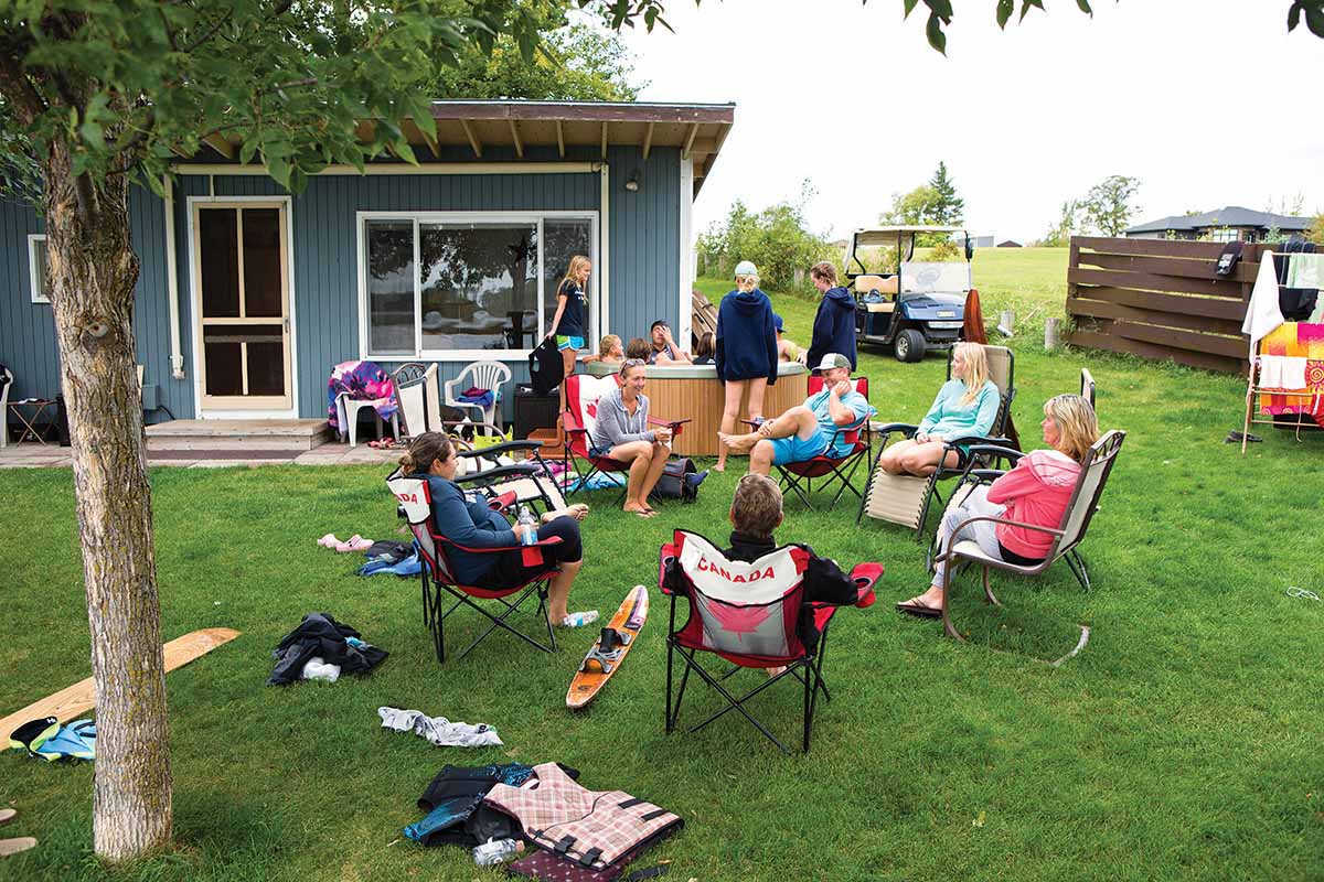 Club de Skinautique members and their families and friends enjoy a hot-tub party at Canadian Chantelle Deslauriers' cabin on the American side of Lake Metigoshe after waterskiing on Saturday, September 10, 2016.