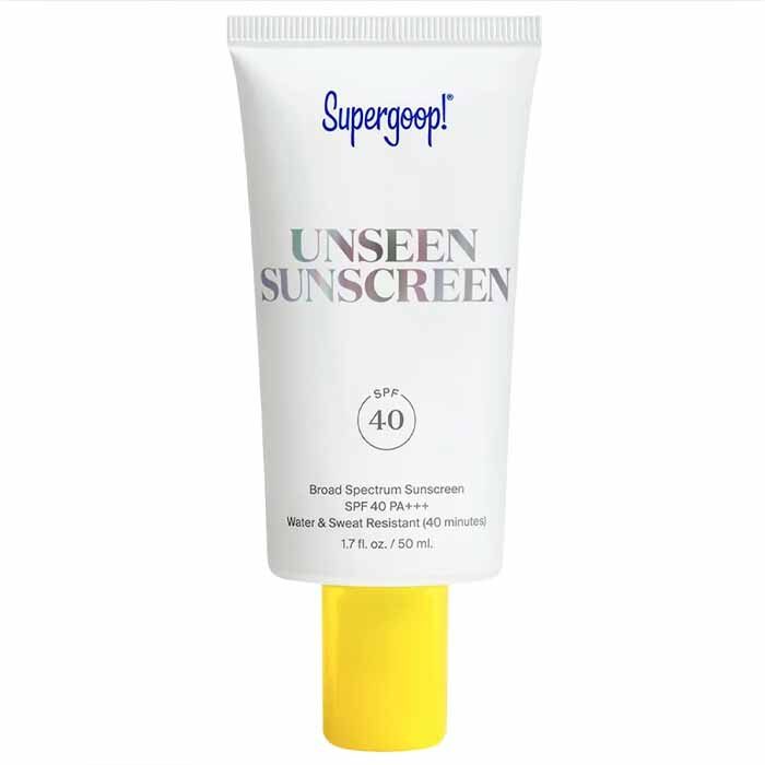 Supergoop sunscreen in white squeeze tube with yellow lid