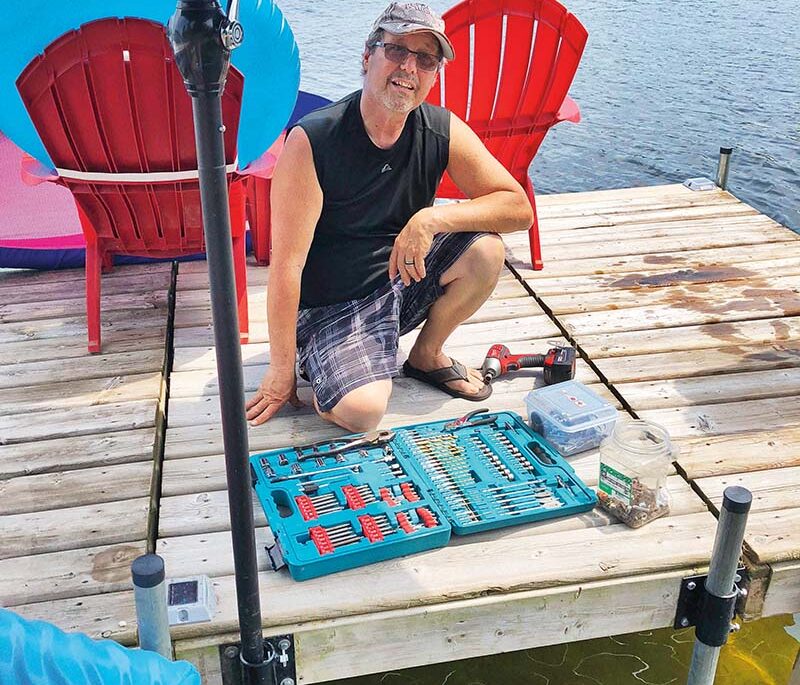 Joe V. on the dock with his tool box