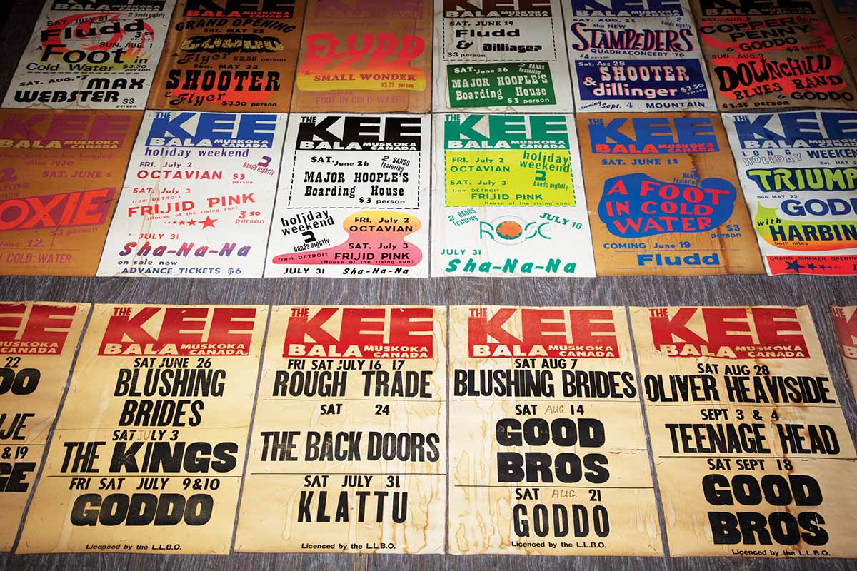 decades’ worth of concert promotion posters on the wall