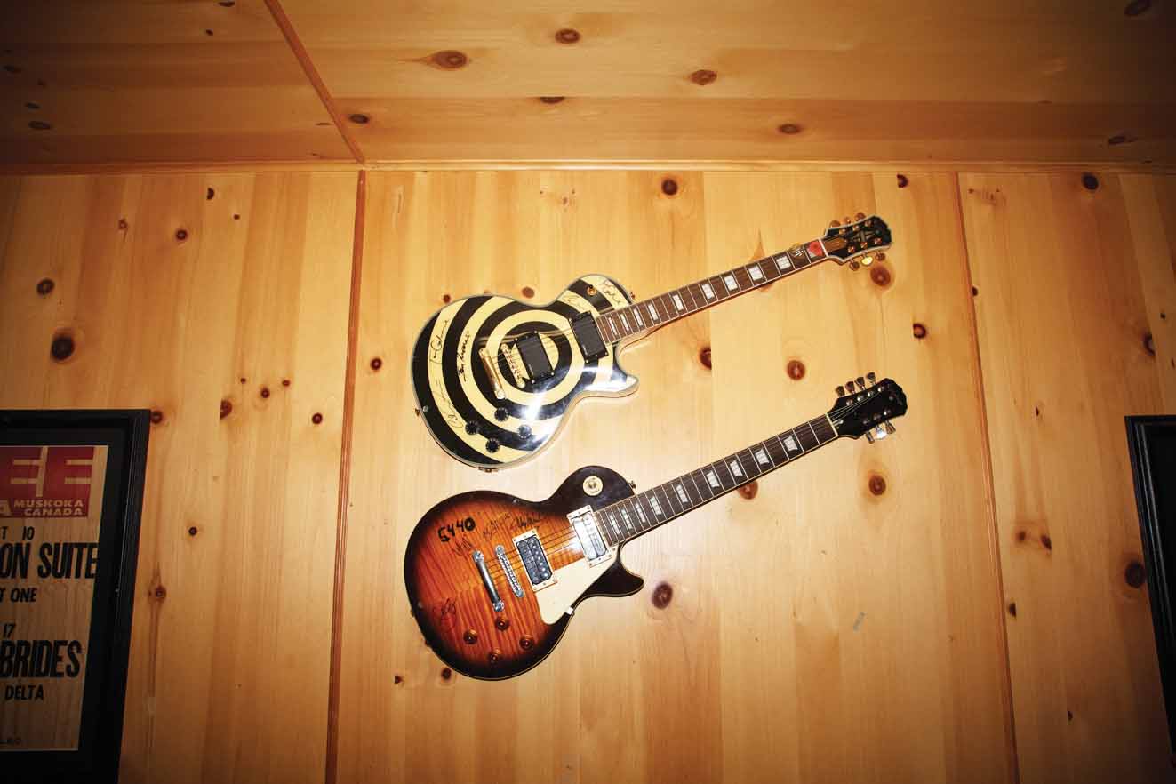 Guitars signed by legendary Canadian acts Tom Cochrane and 54-40 hang on the walls.