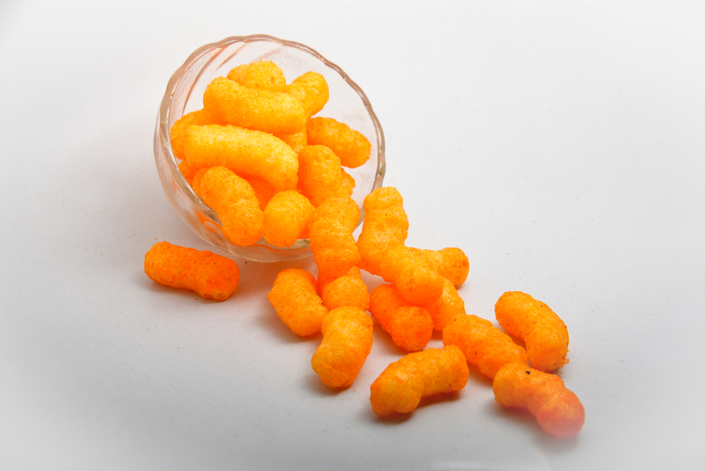 A bowl of cheese puffs