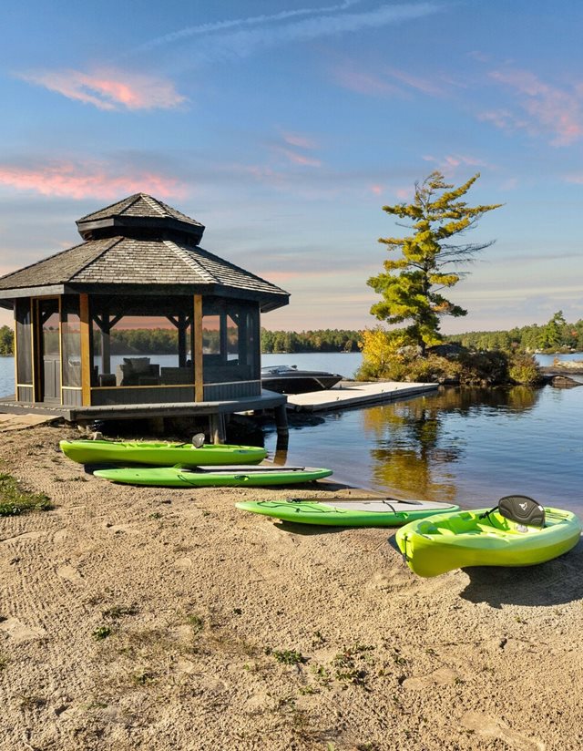 gazebo on the waterfront featuring the 4 green kayaks