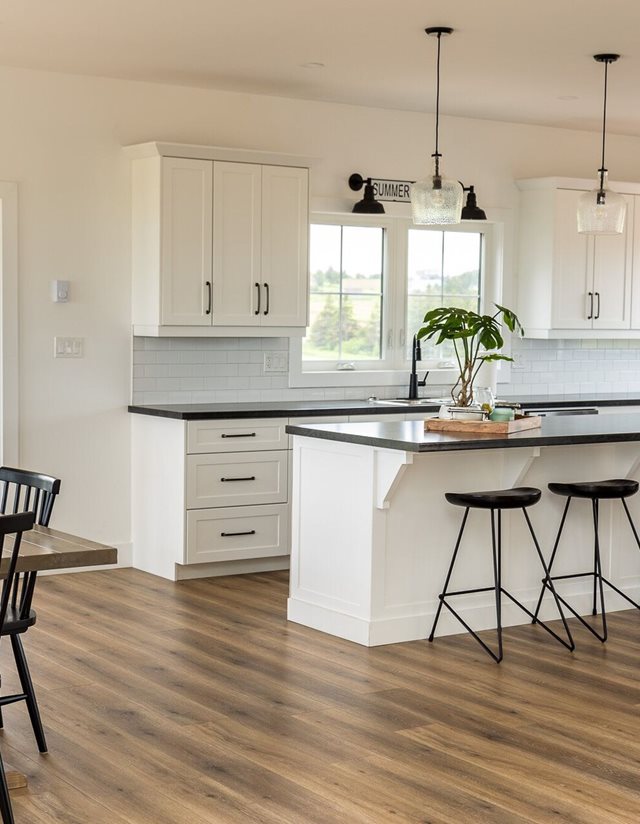 kitchen with island and white cabinets