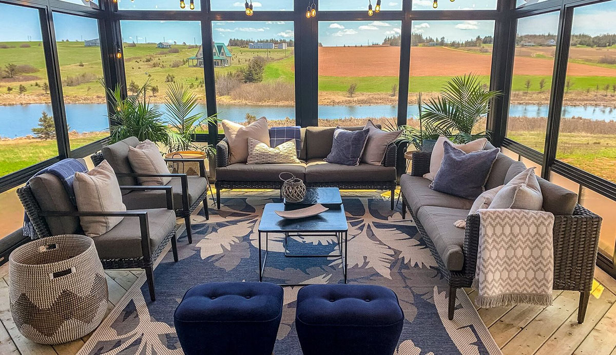 sunroom with lots of seating and windows