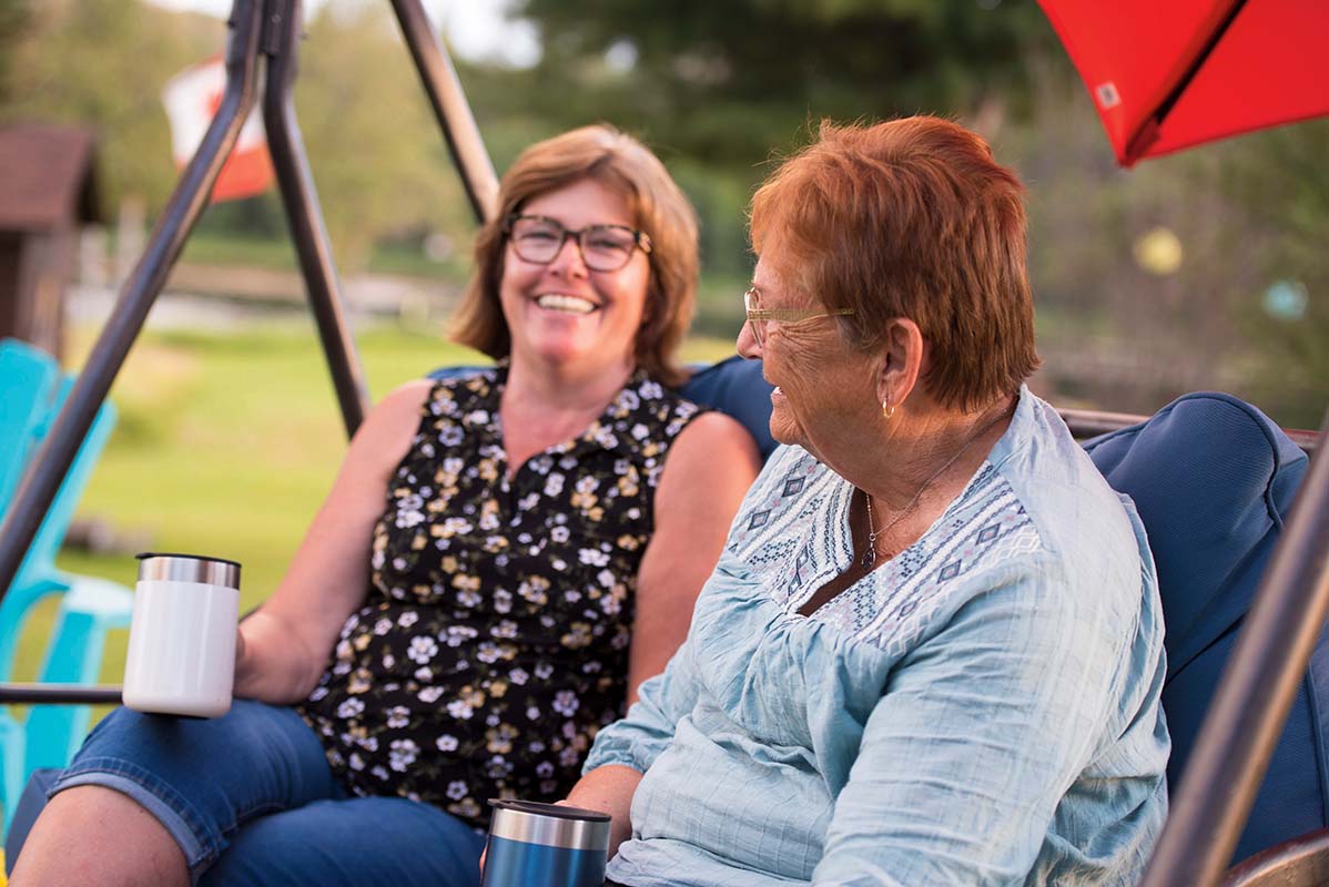 Cindy and Jane sitting and laughing