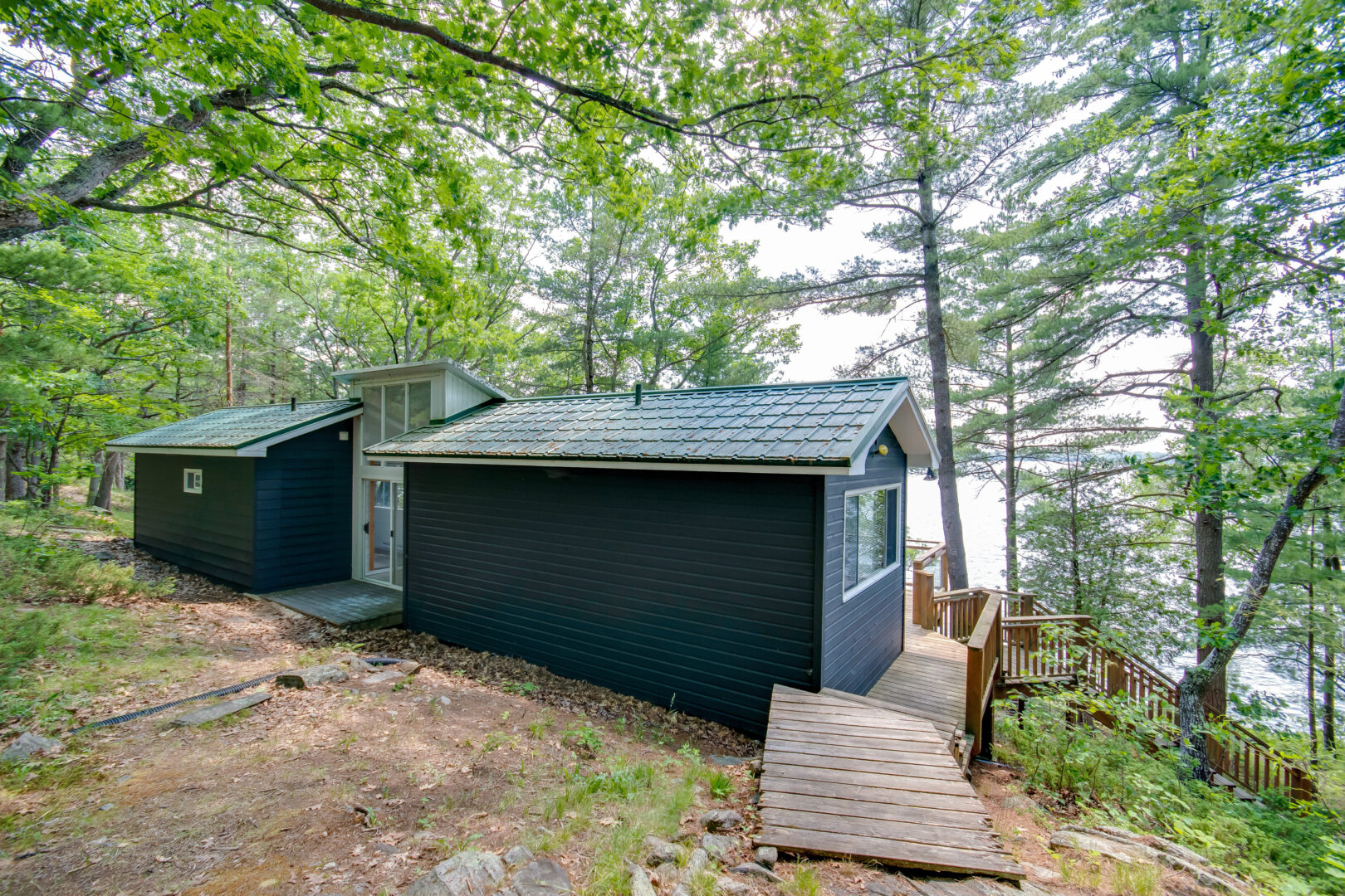 The back of a small but modern guest cabin.