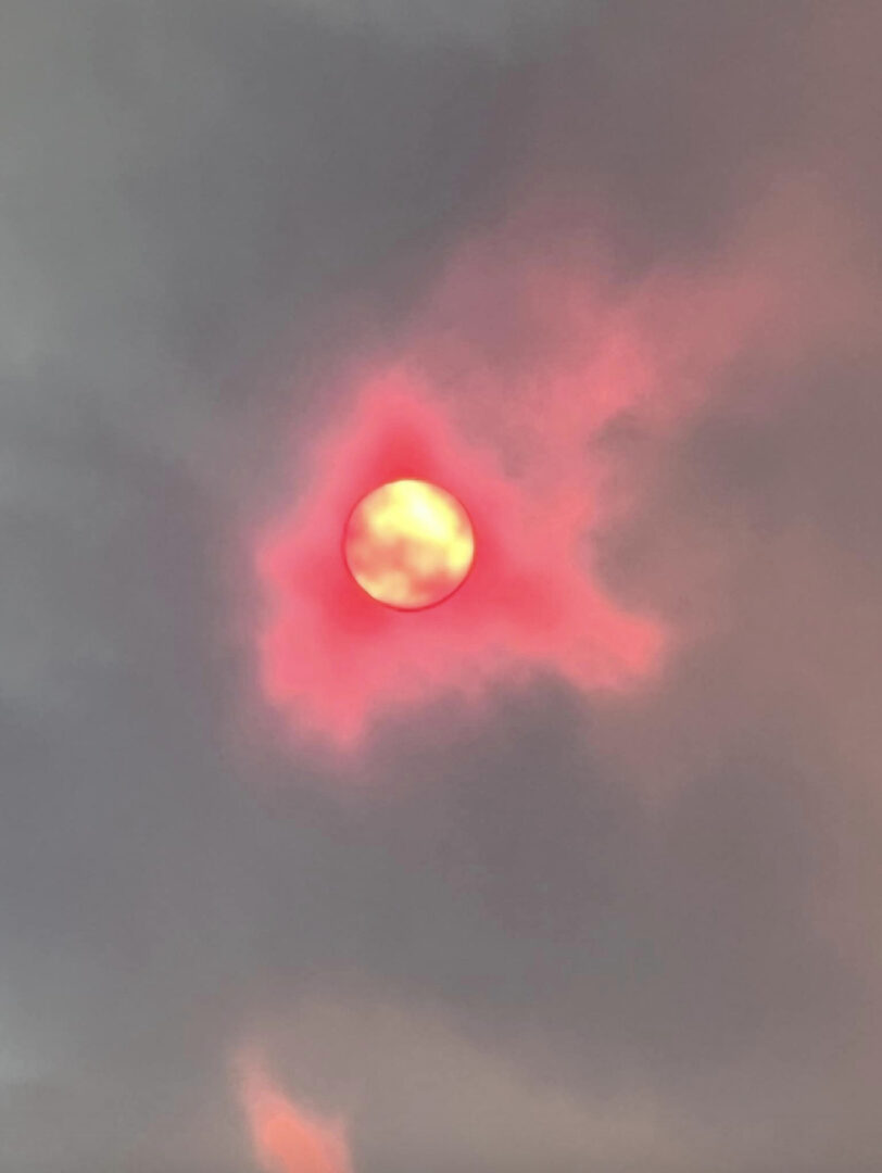 Fire dots the skyline