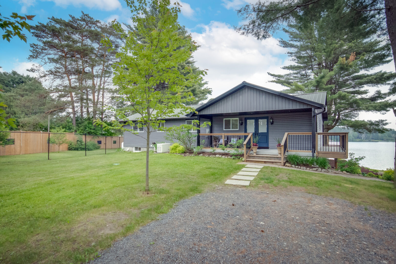 A wide driveway in front of the main entrance of bungalow.