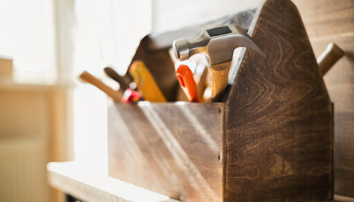 A close up of a wooden toolbox