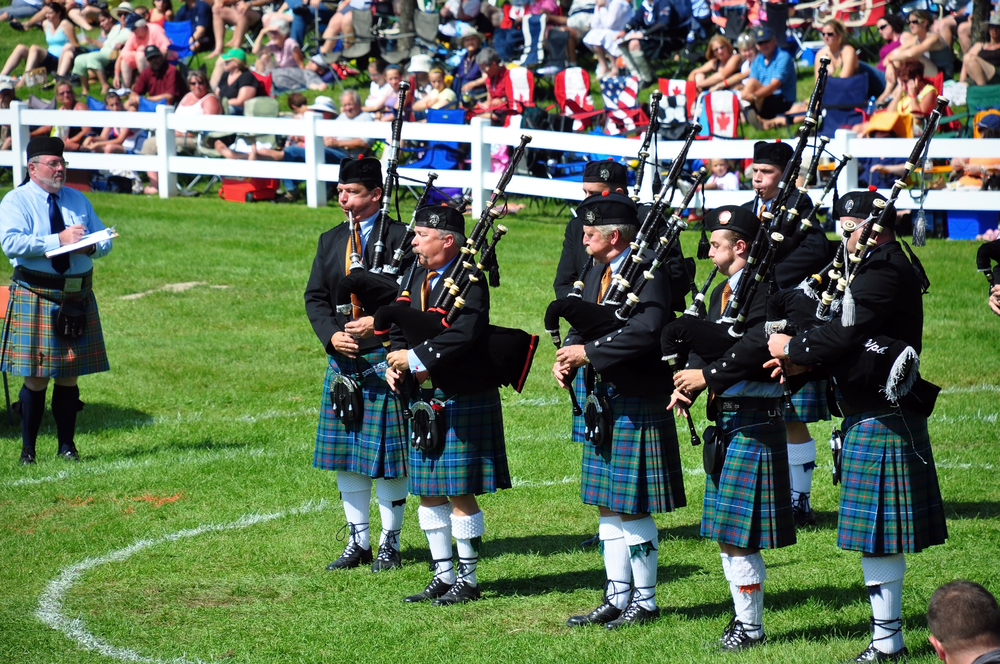 MAXVILLE, CANADA - AUGUST 1: Bagpipe band performs at the annual Glengarry Highland Games August 1, 2009 in Maxville, Ontario. August long weekend events
