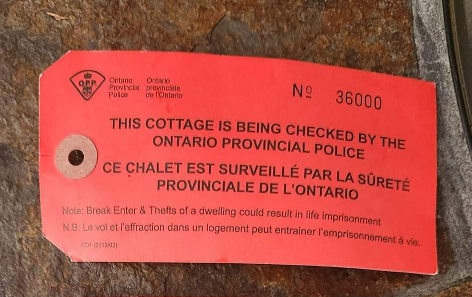 Image example of the red tag appearing on some Parry Sound cottages