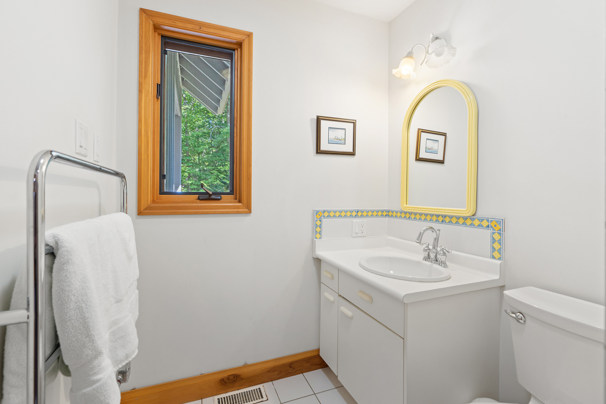 A small bathroom with a toilet and sink.