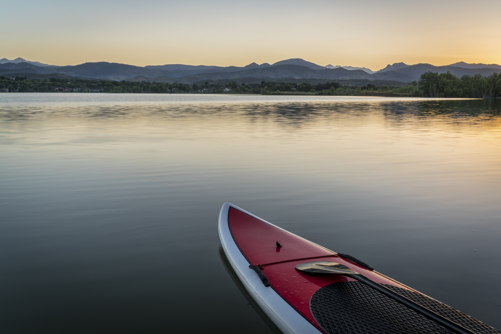 Paddleboard alone on a lake