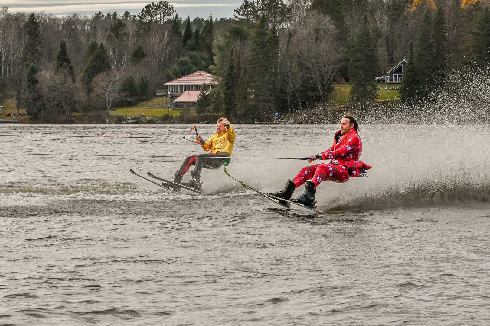 Two waterskiers dressed up for charity