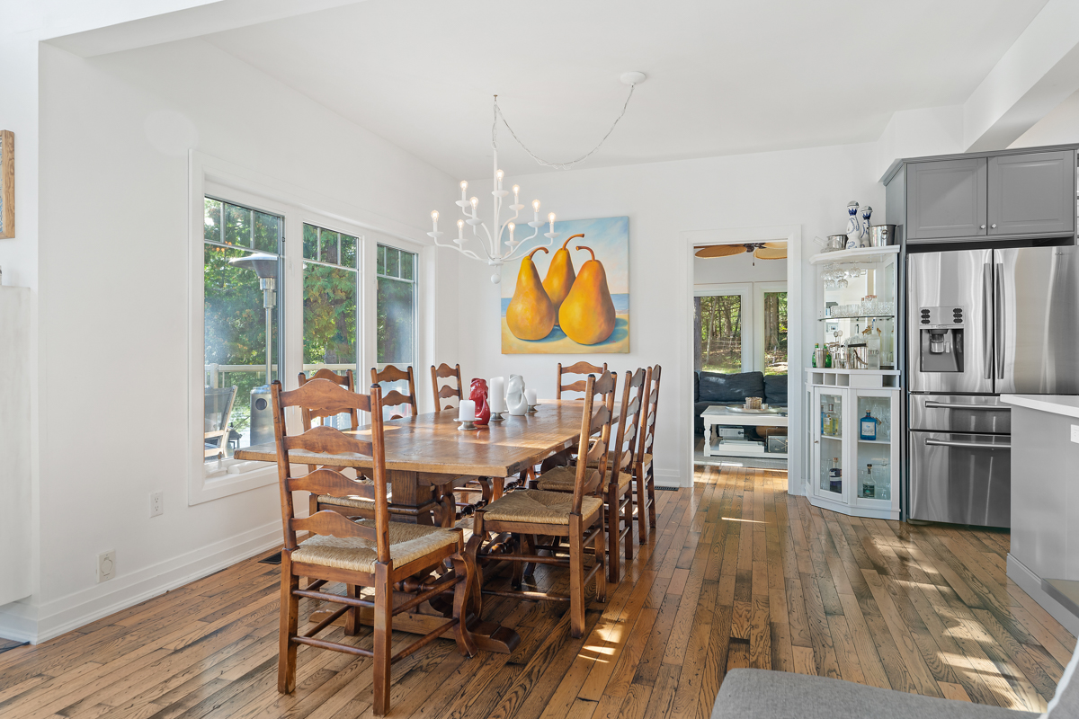 A bright dining area with a table and chairs.