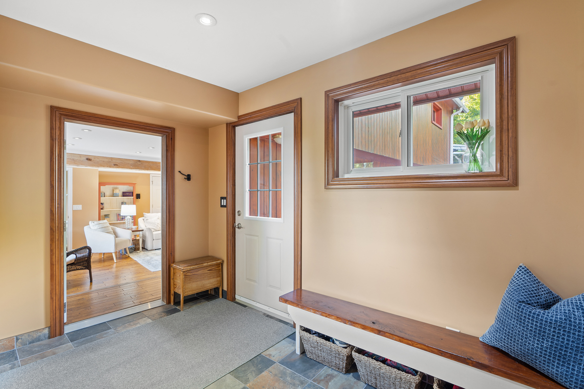 A second entrance with tiled floors.