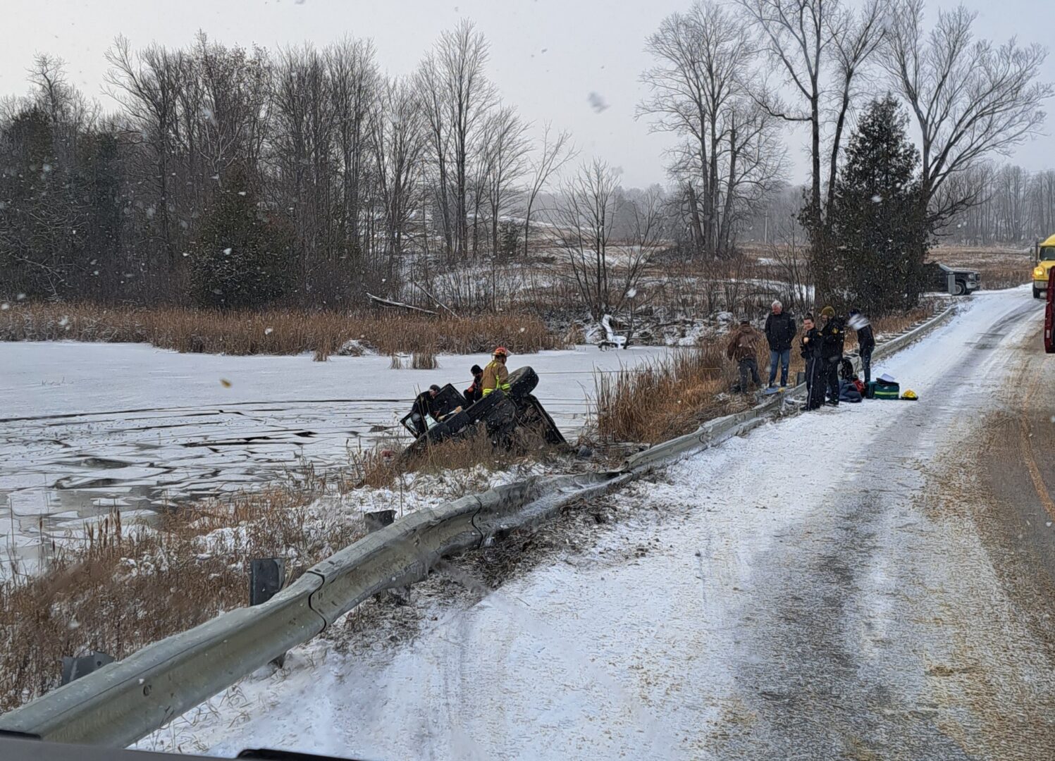 truck submerged in a pond