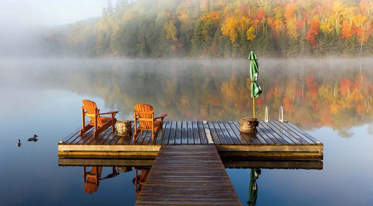 misty lake with dock