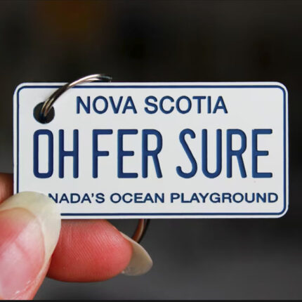 Miniature Nova Scotia license plate that says " OH FER SURE"