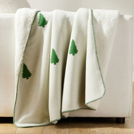 a tree-patterned blanket