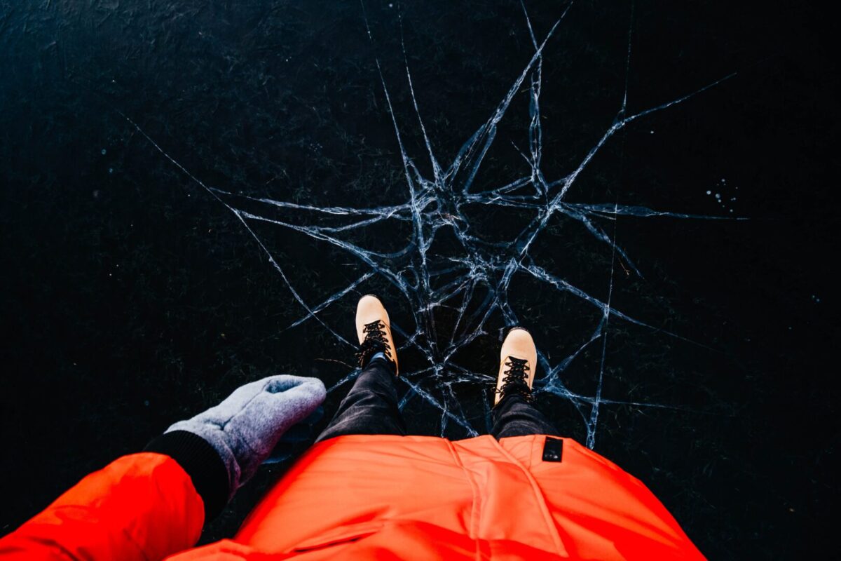 a person standing on cracking ice
