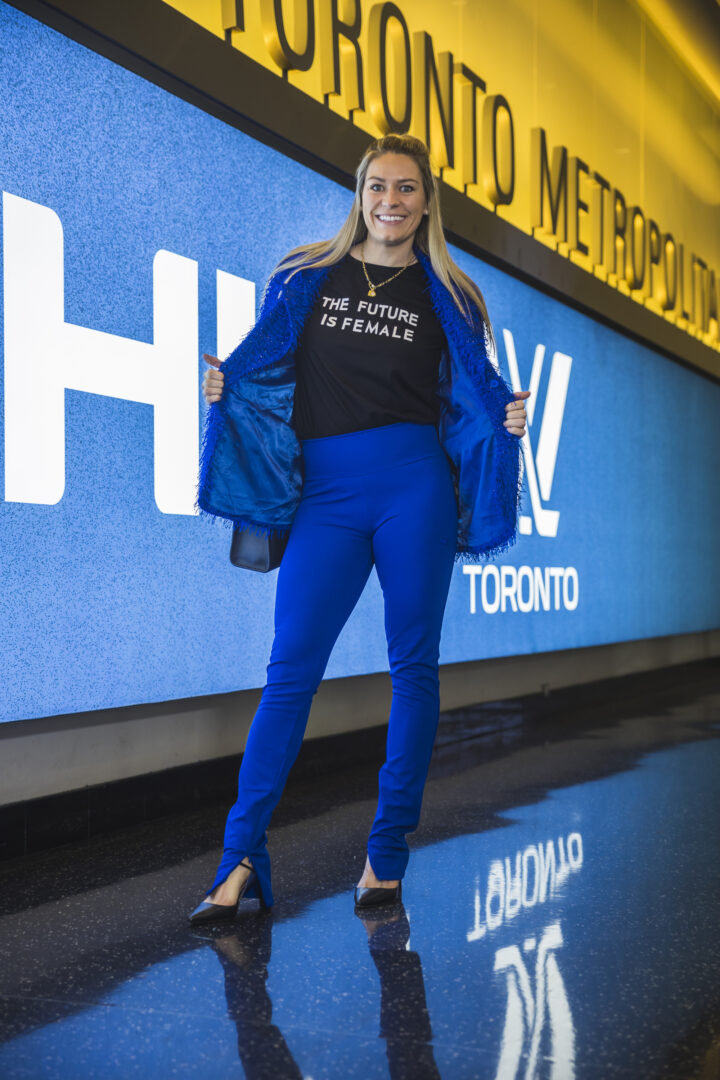 natalie spooner wearing a shirt that says the future is female