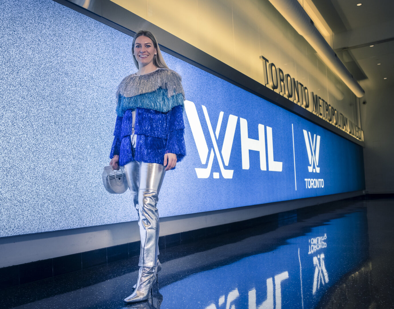 natalie spooner in a blue and silver outfit