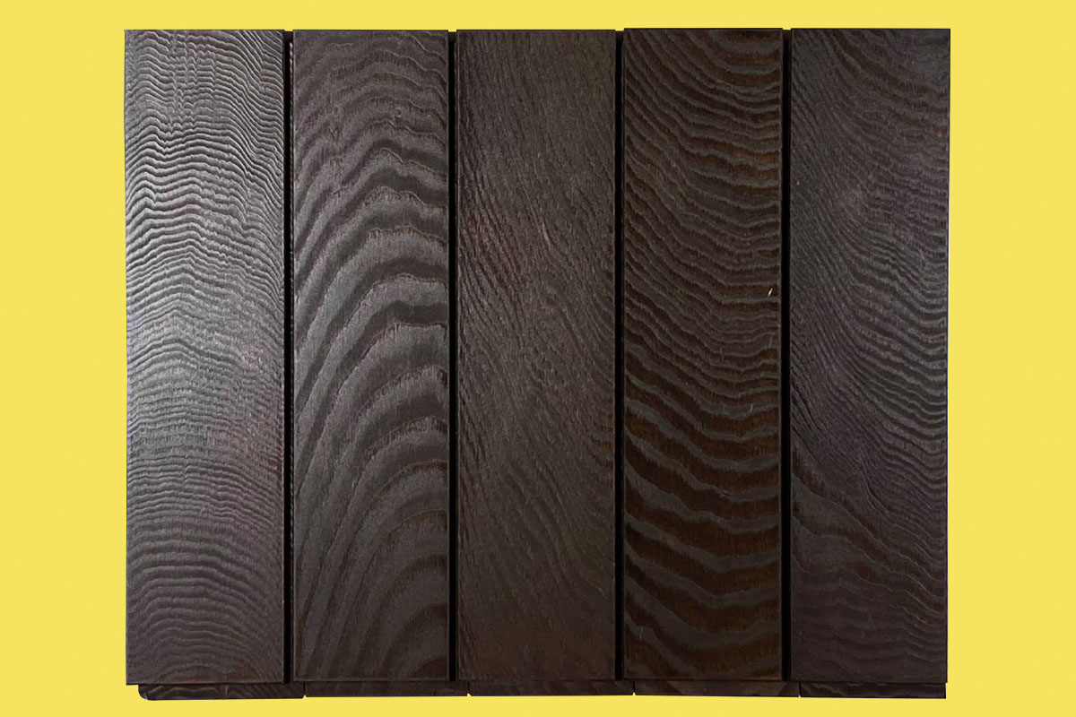 A wall tile in a dark stain