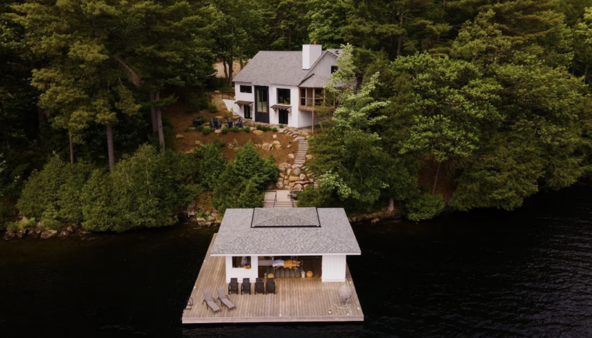 bird's eye view of the dock and cottage
