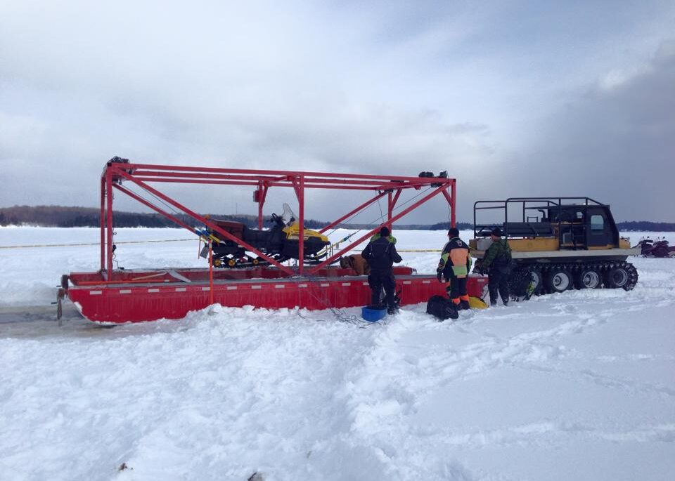 Snowmobile on a Frozen Lake