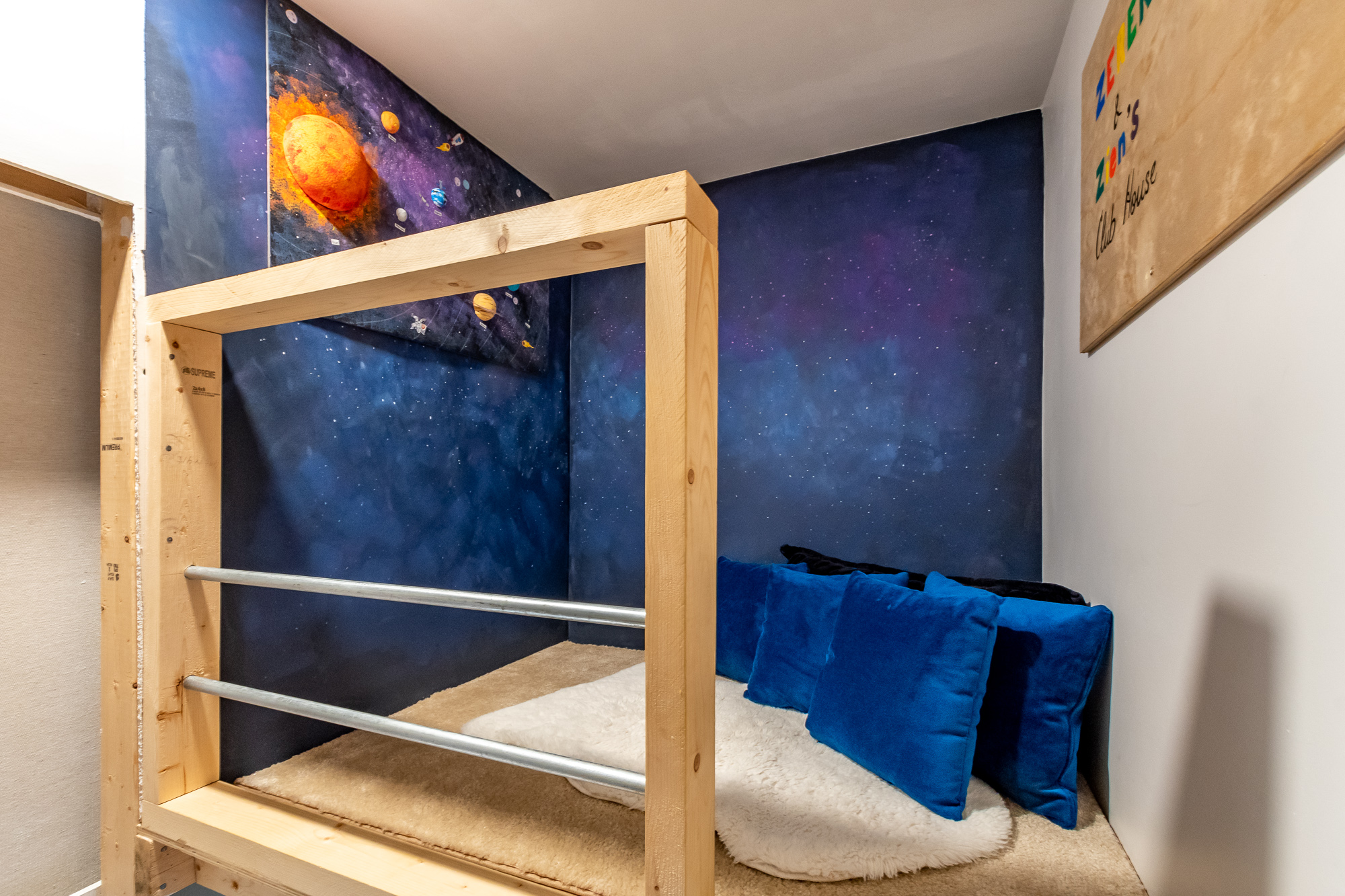a planet-themed loft space