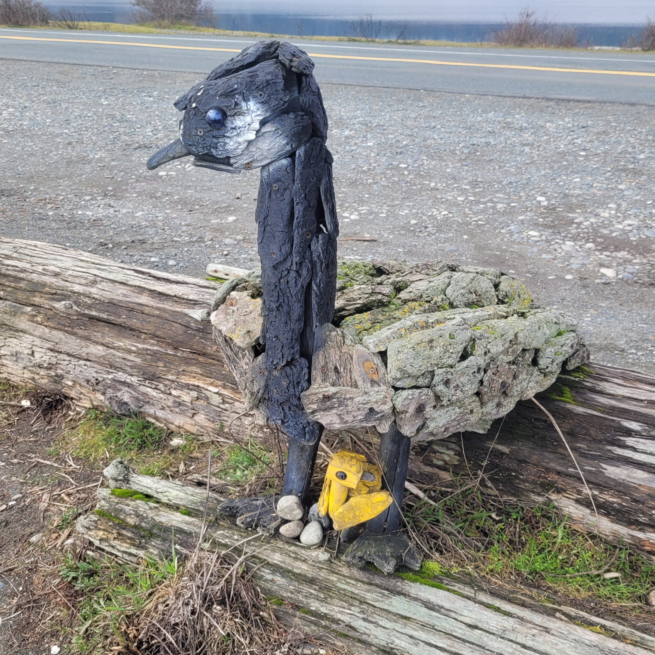 a driftwood sculpture of a canada goose