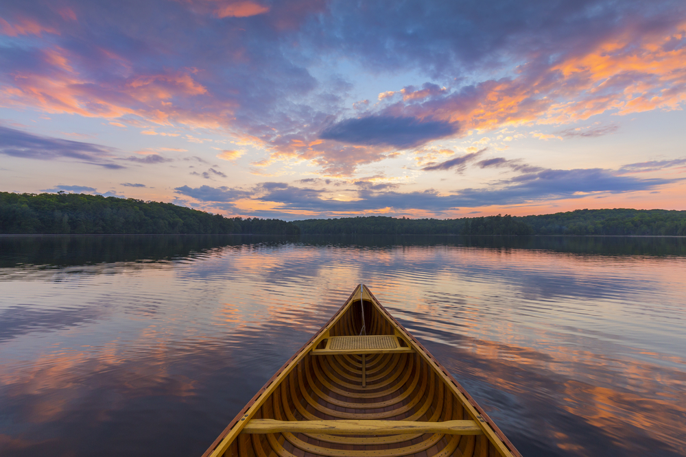 A canoe on the lake, photo taken from paddler's point of view