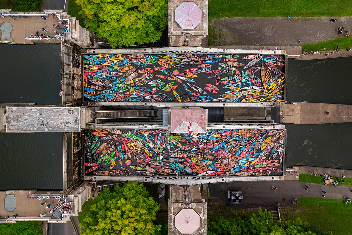 people in kayaks and canoes on the trent-severn waterway in peterborough