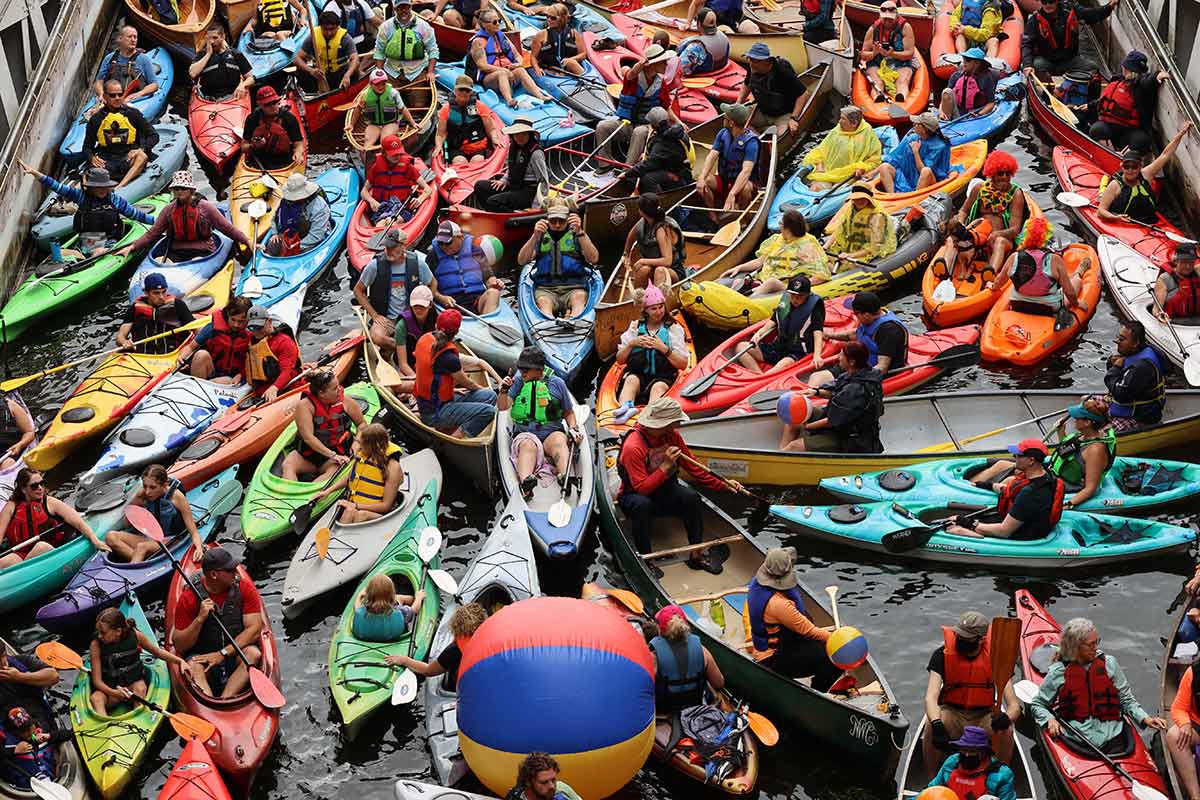 people in kayaks and canoes on the trent-severn waterway in peterborough