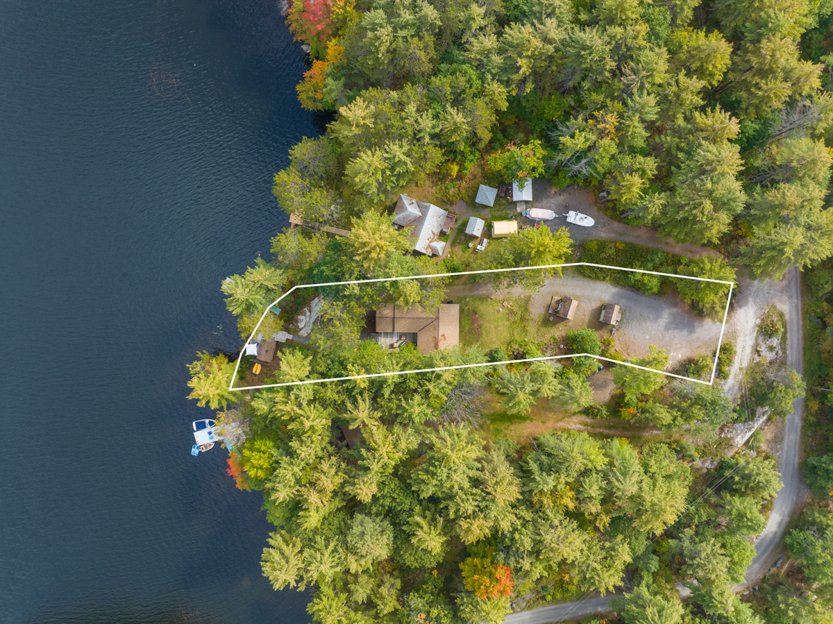 Aerial view of the property, which is outlined in white