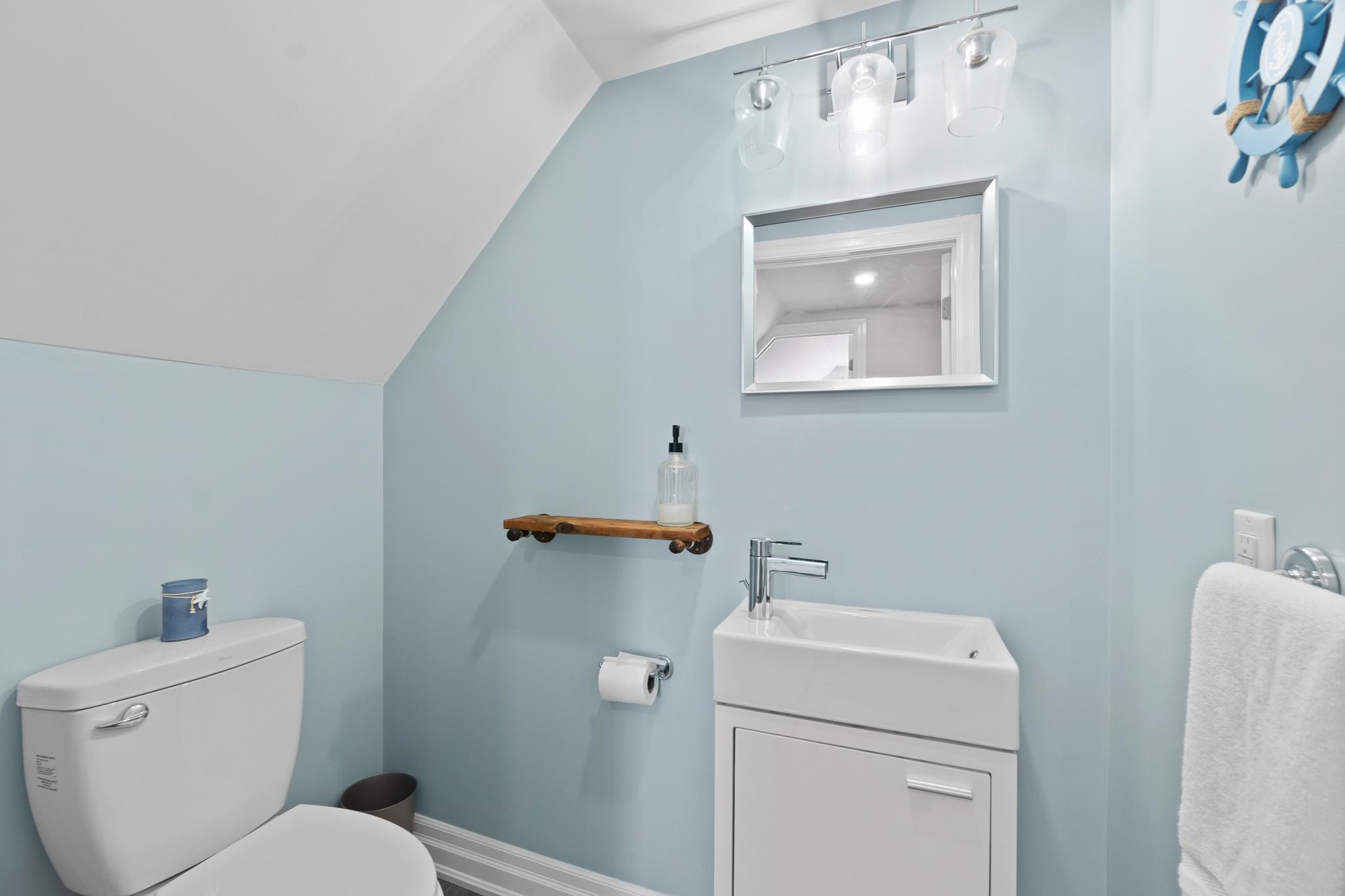 a bathroom with a toilet and sink