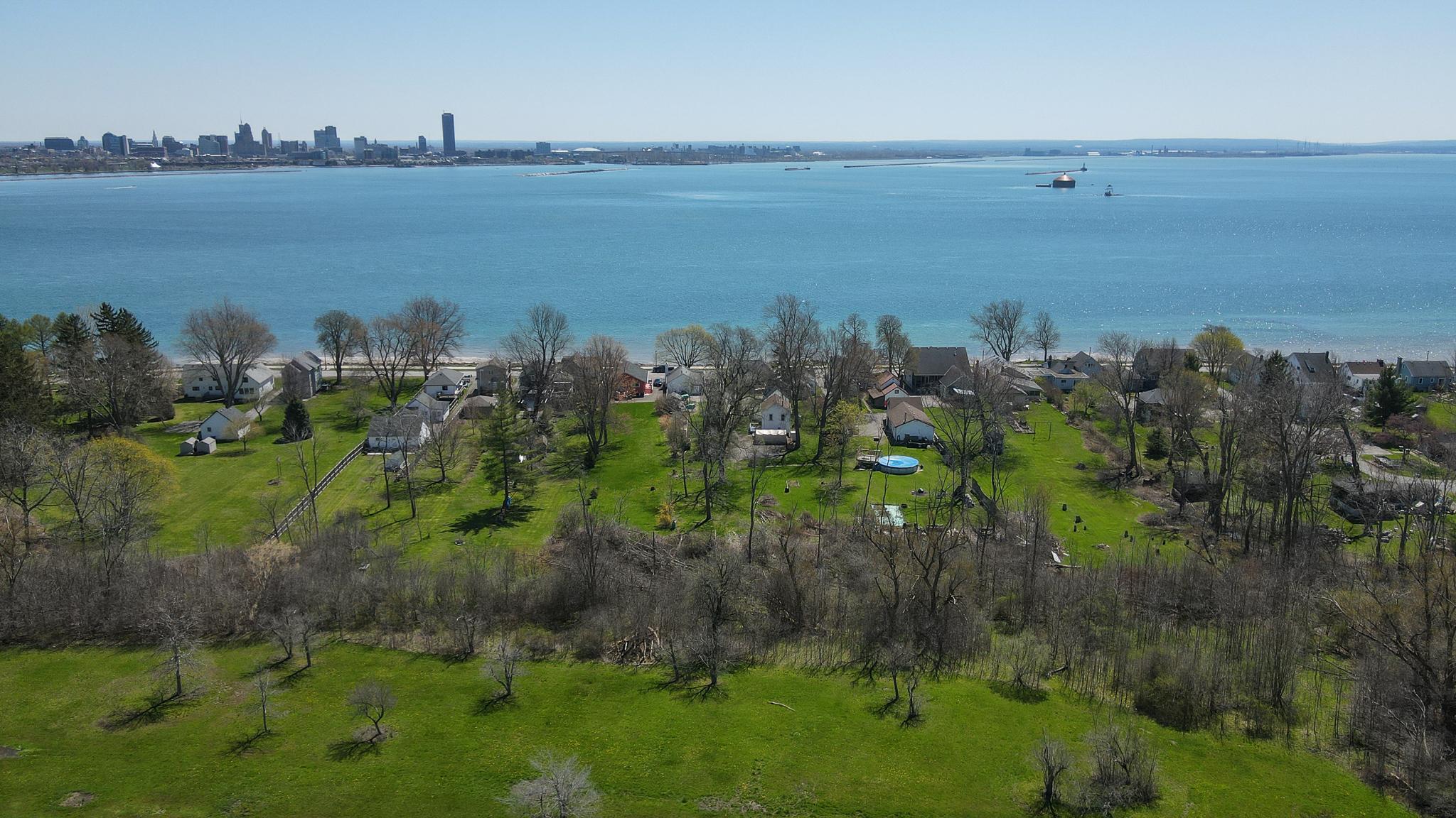 aerial photo of a property and water