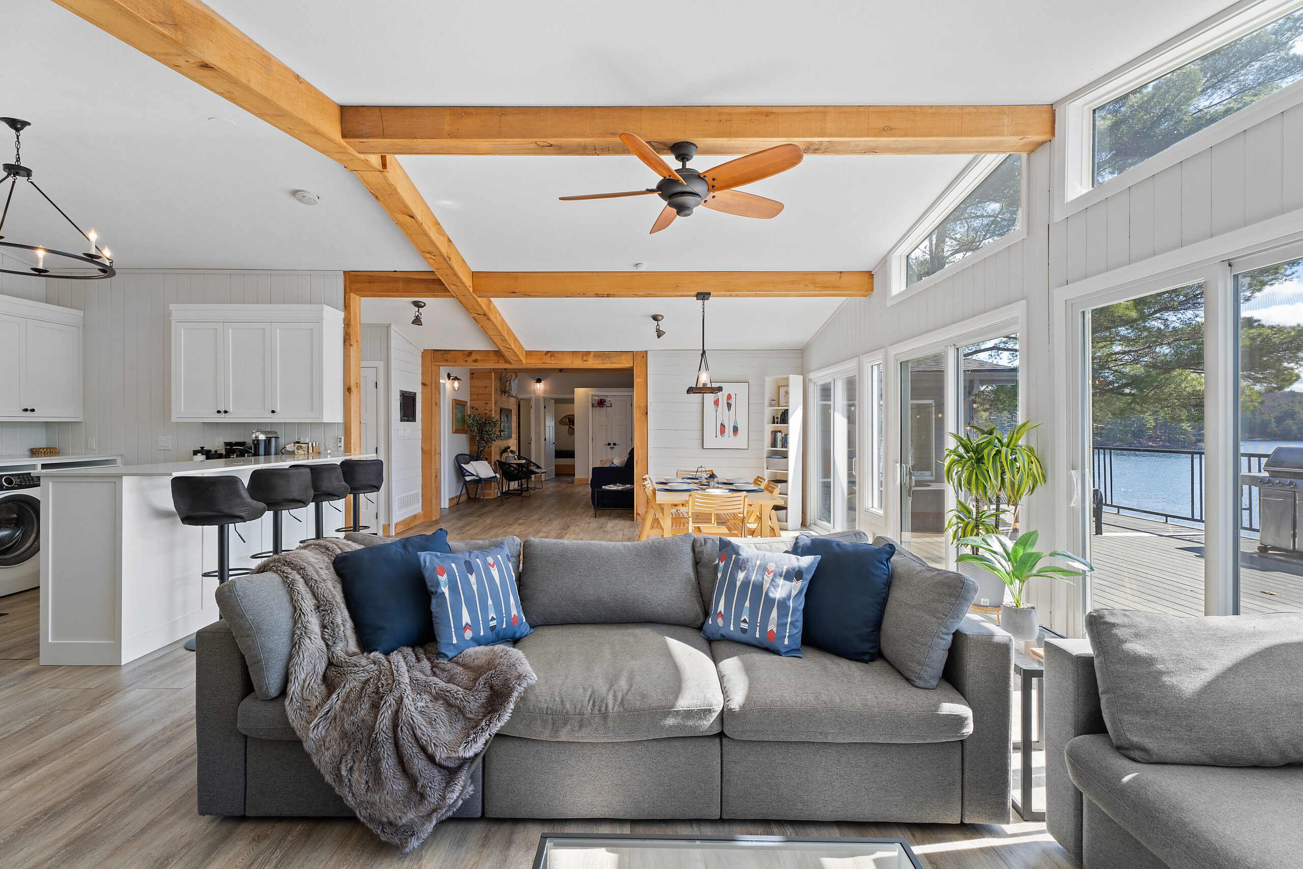 Grey couch with blue pillows