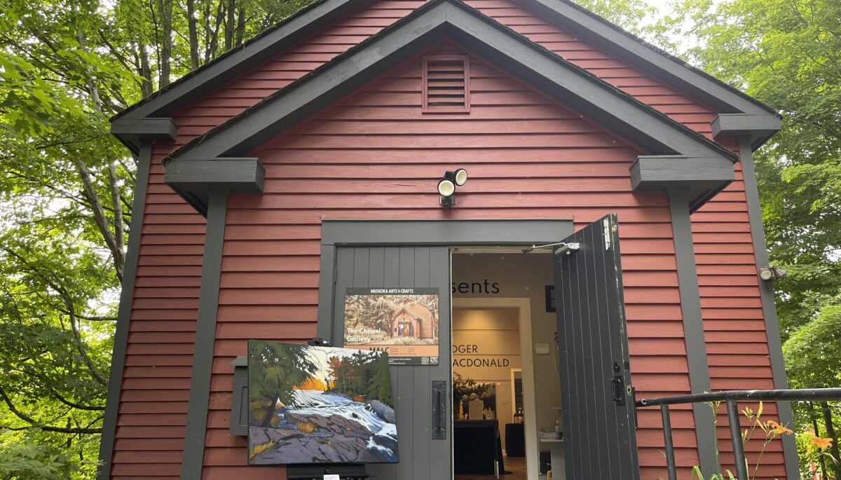 Red building with a painting outside