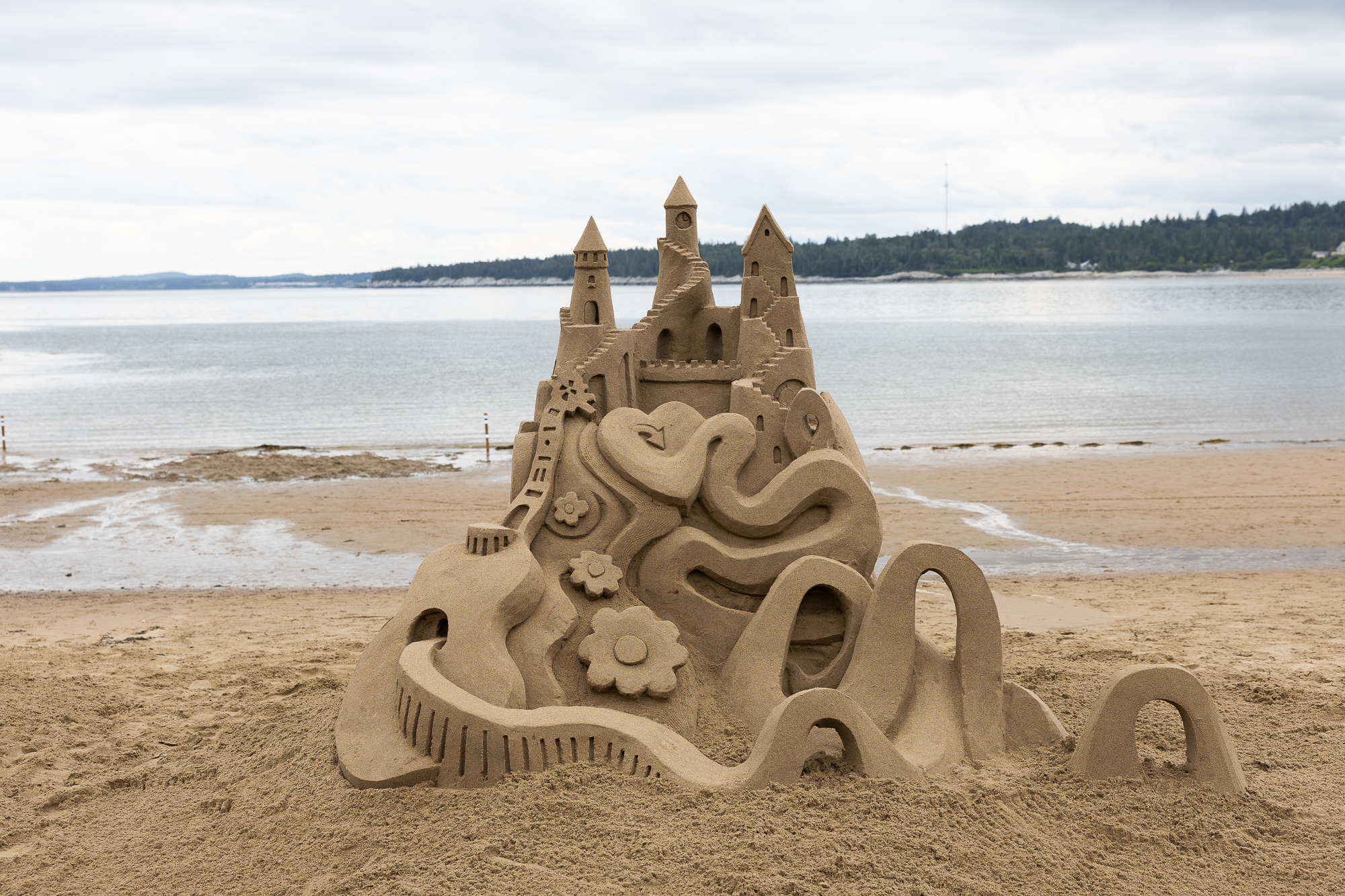 A floral-decorated sandcastle