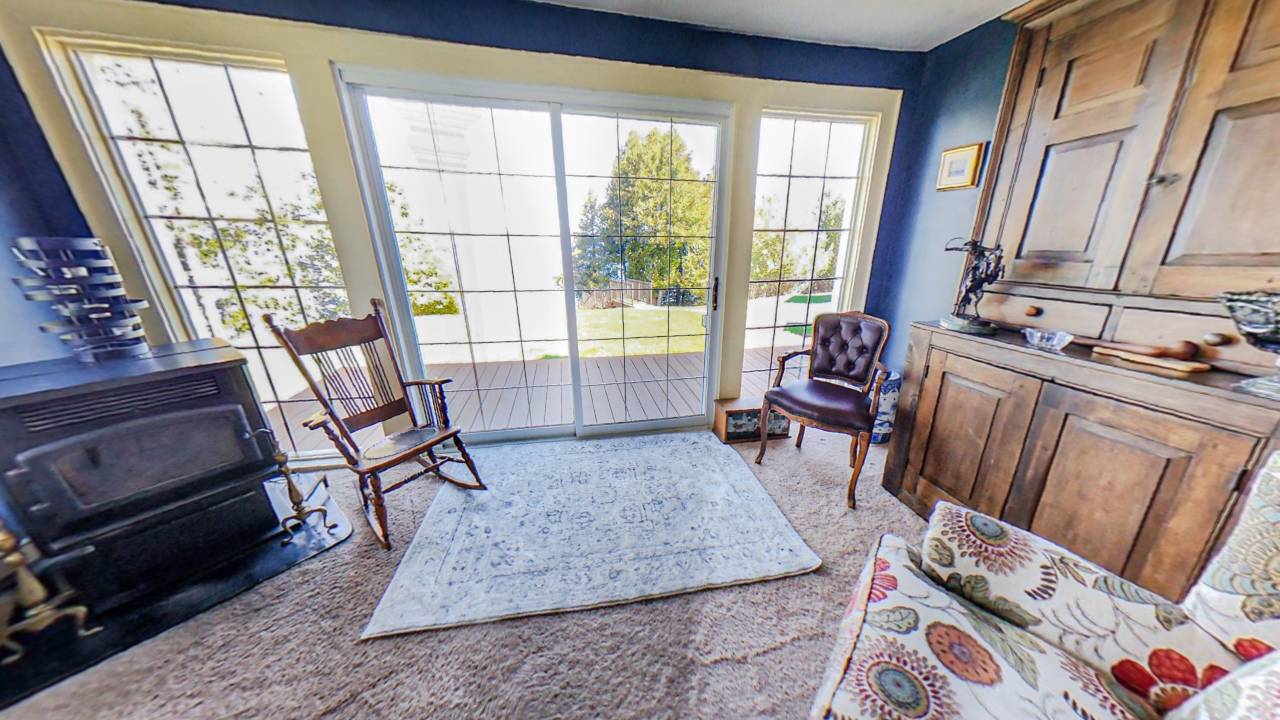 A wall of white French doors