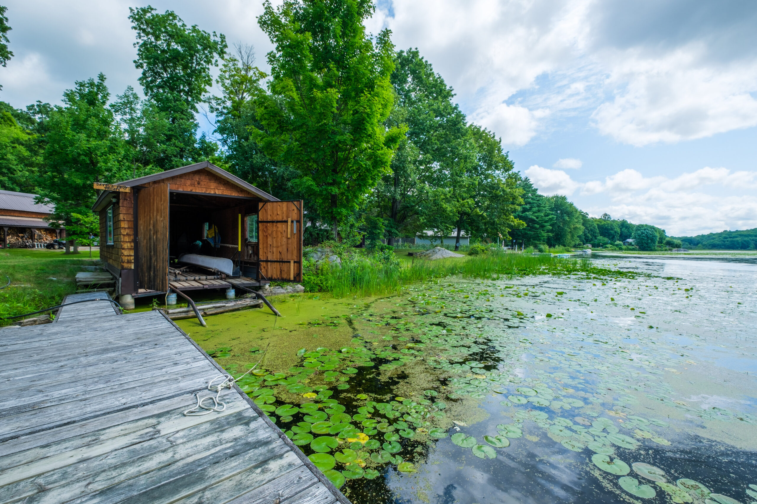 a boathouse on the water
